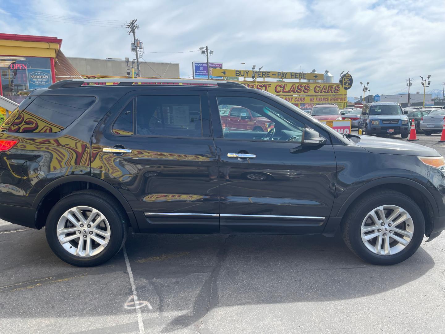 2013 Black /Black Ford Explorer XLT (1FM5K8D86DG) with an 3.5 Liter V6 engine, Automatic transmission, located at 801 South State Street, Salt Lake City, UT, 84111, (801) 328-0098, 40.751953, -111.888206 - Features Top Features: 4WD/AWD, Parking Sensors, Alloy Wheels, Rear Air Conditioning, Bluetooth Technology, Rear View Camera, Fold-Away Third Row, Satellite Radio Ready, Front Seat Heaters, Third Row Seat, Leather Seats Basic Features: ABS Brakes, Auxiliary Audio Input, Power Locks, Rear Defro - Photo#3
